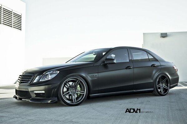 Luxury black mercedes benz e63 car