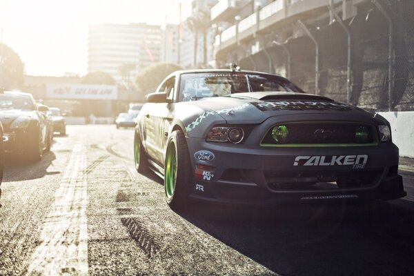 Grey ford mustang on asphalt