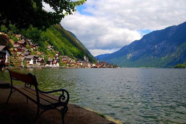 Bench by the lake among the mountains