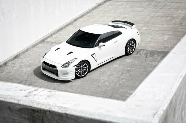Image of a white Nissan car