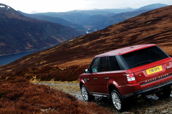 Red car in the highlands