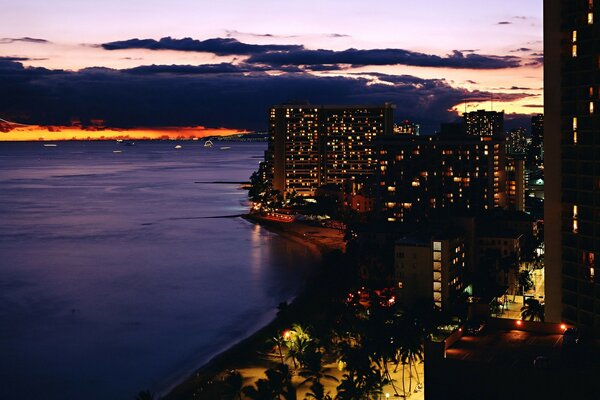 Evening lights on the ocean coast