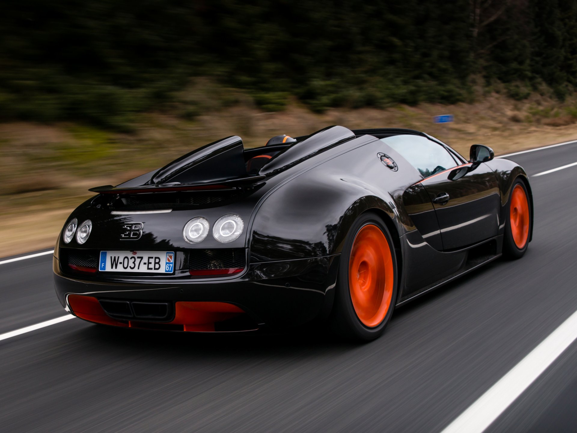 bugatti veyron grand sport roadster vitesse wrc edition auto strada velocità supercar nero arancione