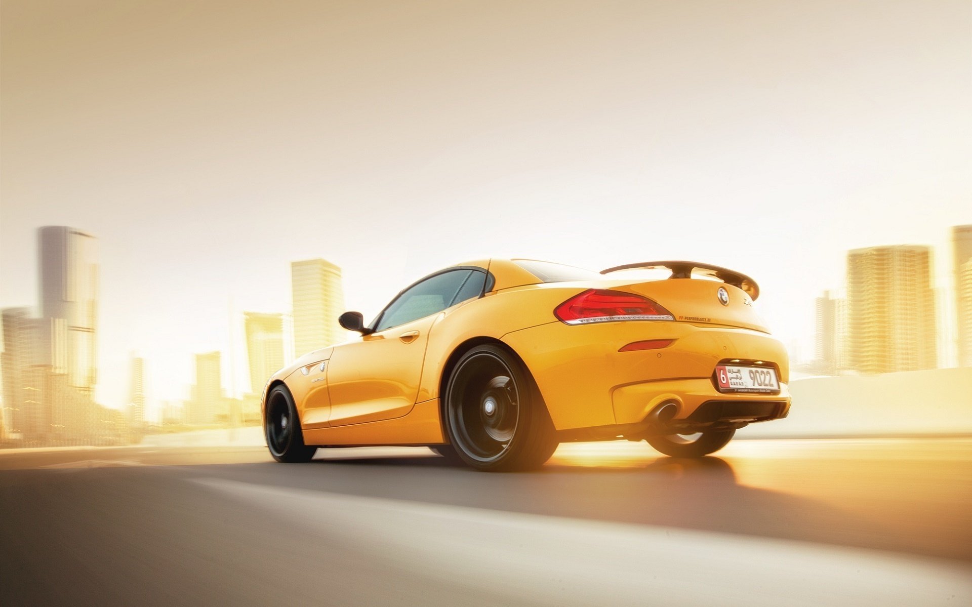 bmw z4 giallo auto tramonto velocità posteriore