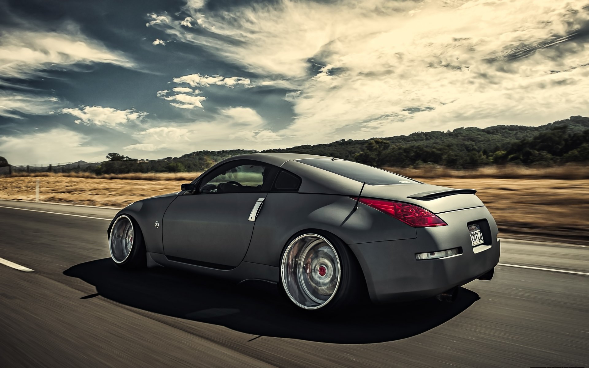 nissan 350z position nissan grau straße geschwindigkeit in bewegung