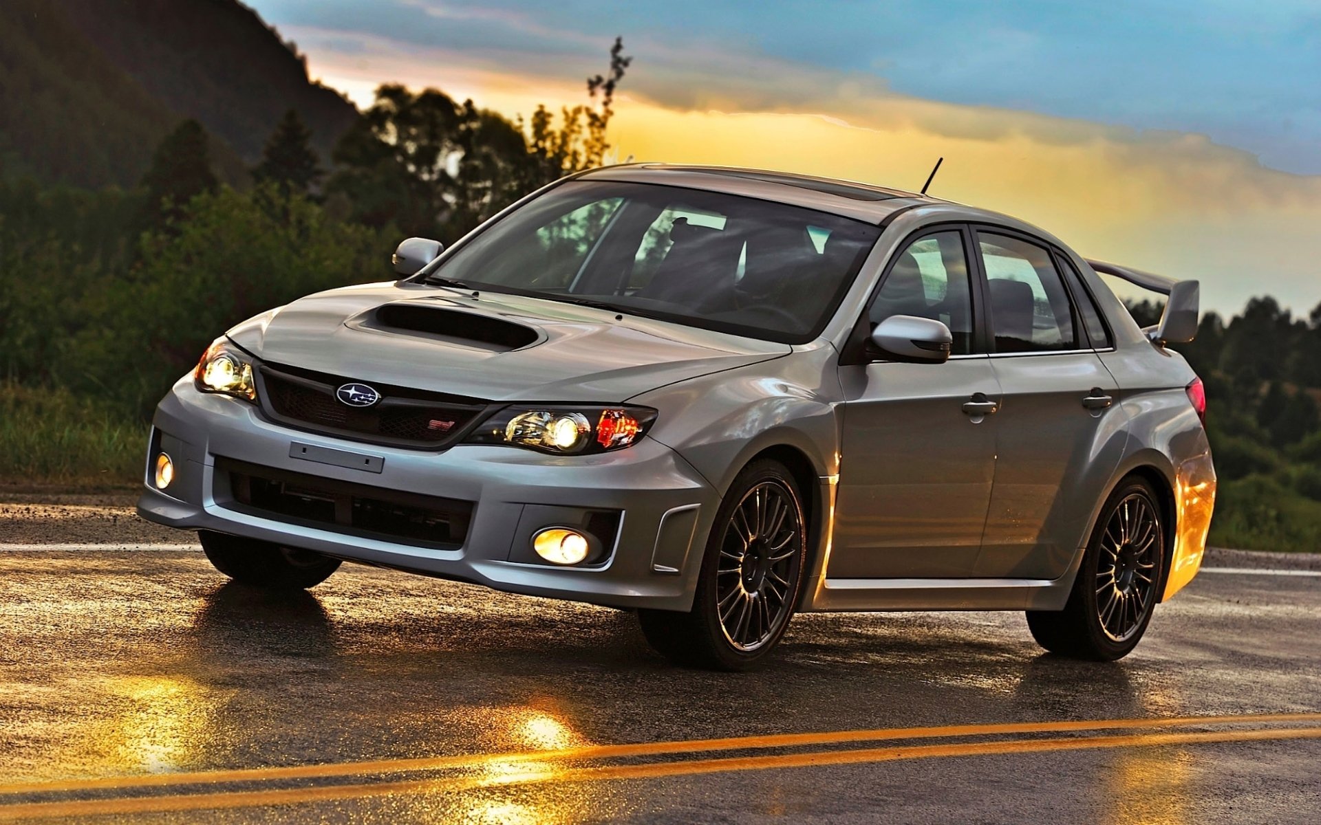 ubaru impreza wrx sti subaru impreza sedan front road reflections sky