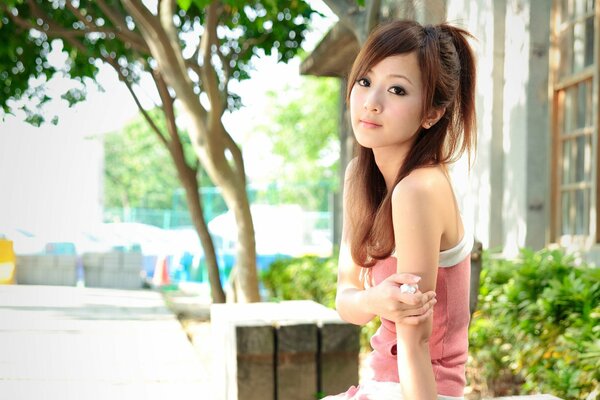 Young beautiful shy Japanese woman