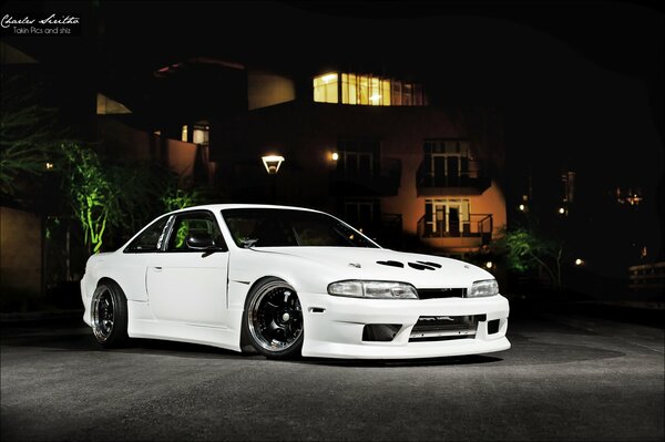 Car Nissan s14 240 sx in the courtyards of city streets