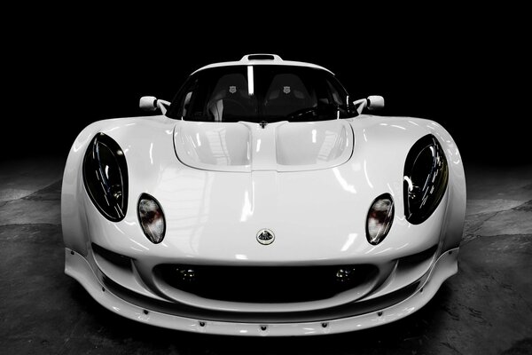 Photo of a white sports car with a front and headlights