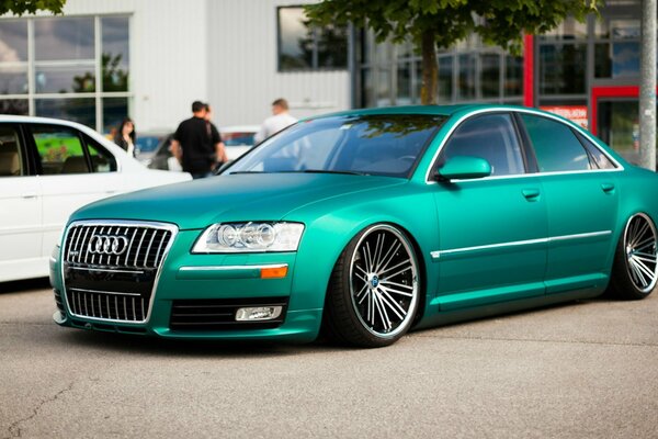 Emerald-colored Audi at the car show