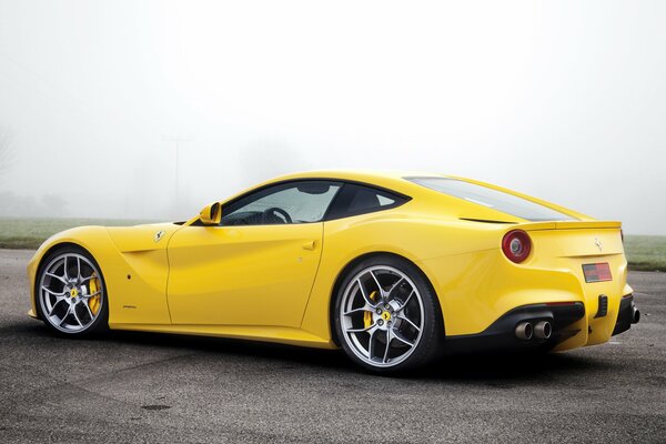 Ferrari novitec rosso f12berlinetta yellow side view