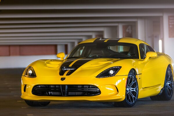 Yellow Dodge Viper GTS in the parking lot