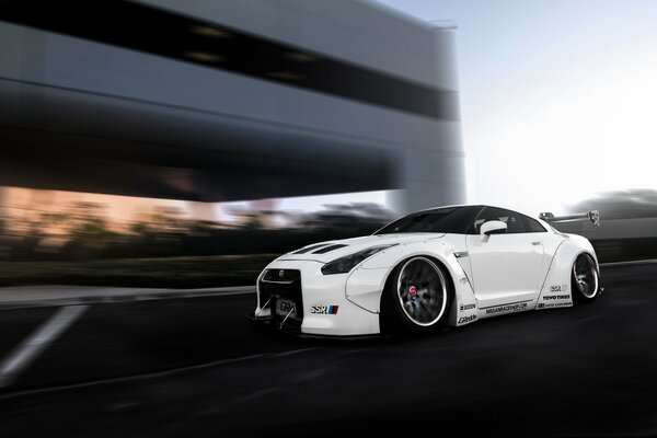 White sports car in motion