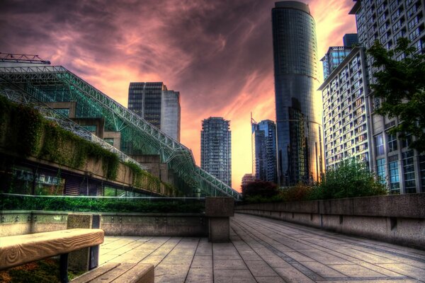 Skyscrapers of city buildings at sunset