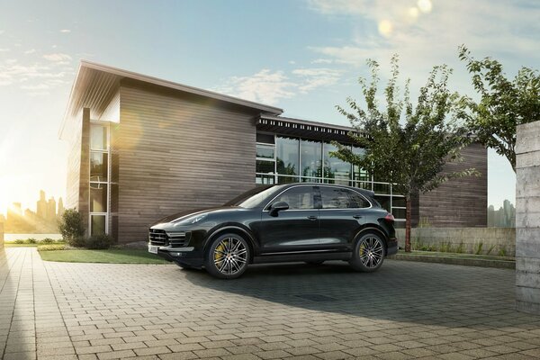 Porsche cayenne and beautiful mansion