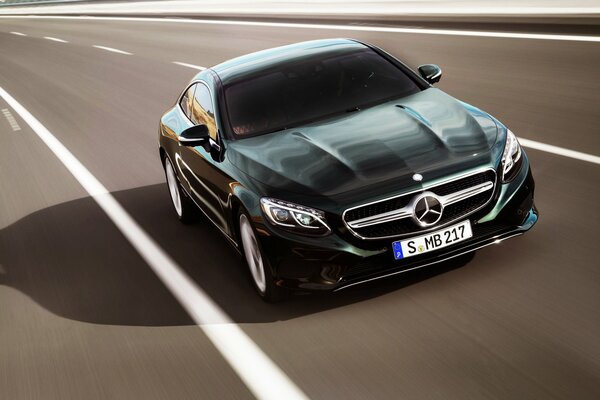 Mercedes C Class coupe car in motion