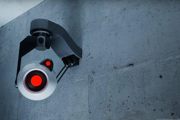 Surveillance camera on a gray wall