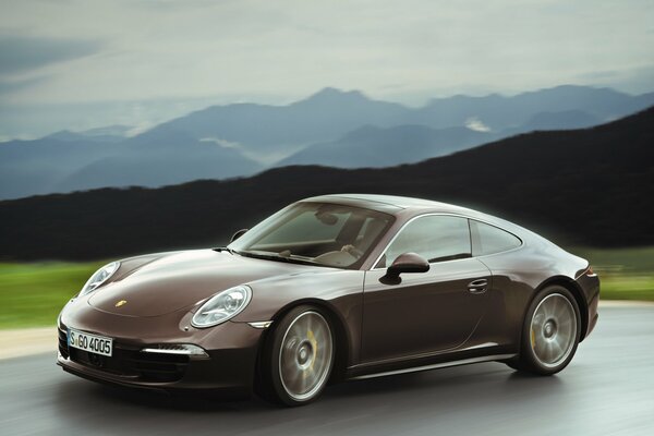 Brown Porsche carrera on the highway drawing