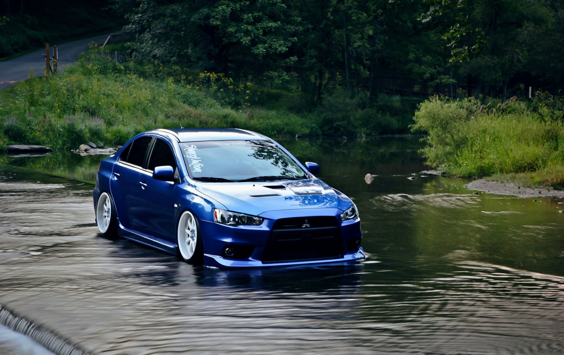 mitsubishi lancer evo blue water