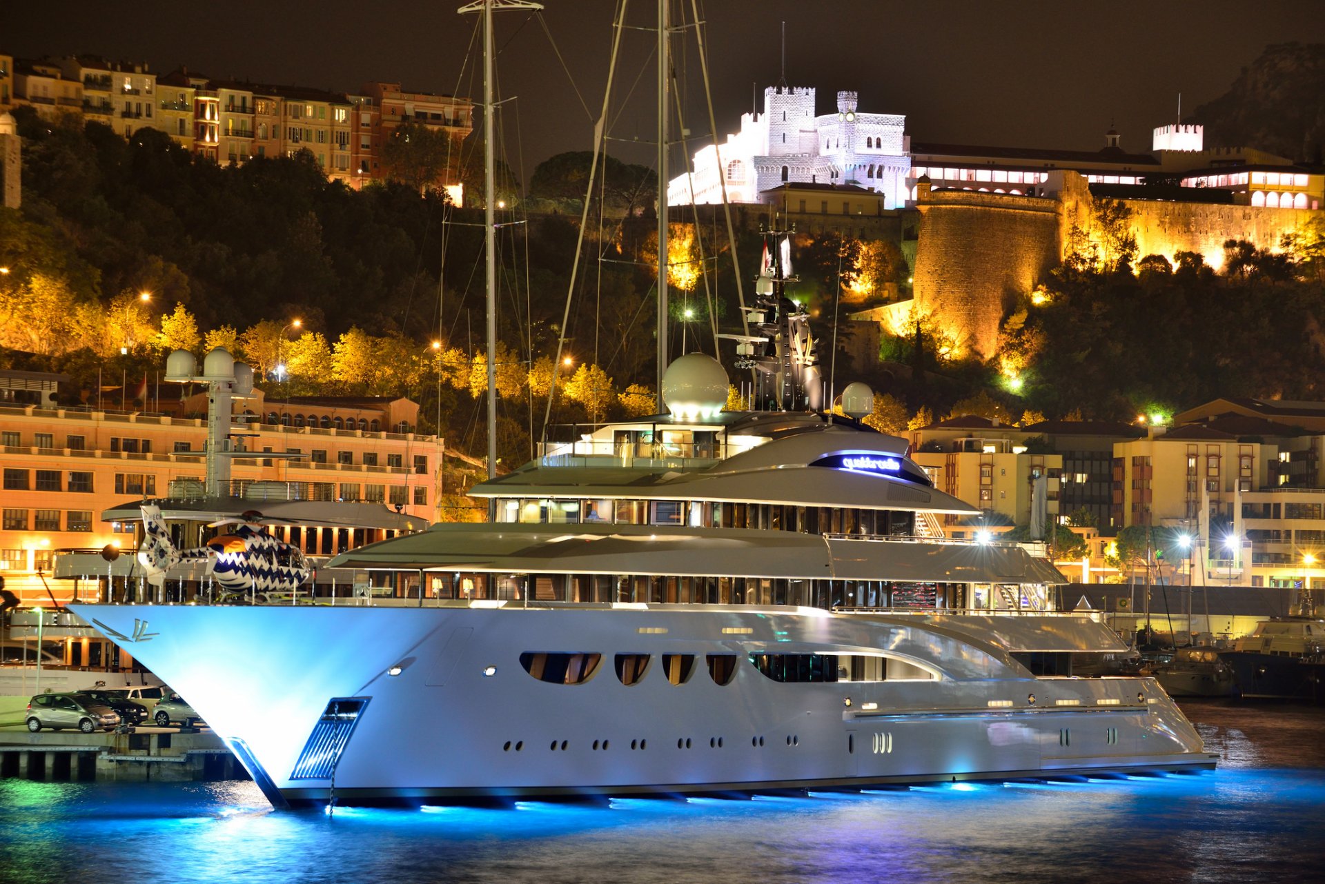 mega yacht motor yacht super yacht quattroelle city monaco monte carlo night mega yacht motor super yacht helicopter monte carlo port houses mountain castle palace evening lights