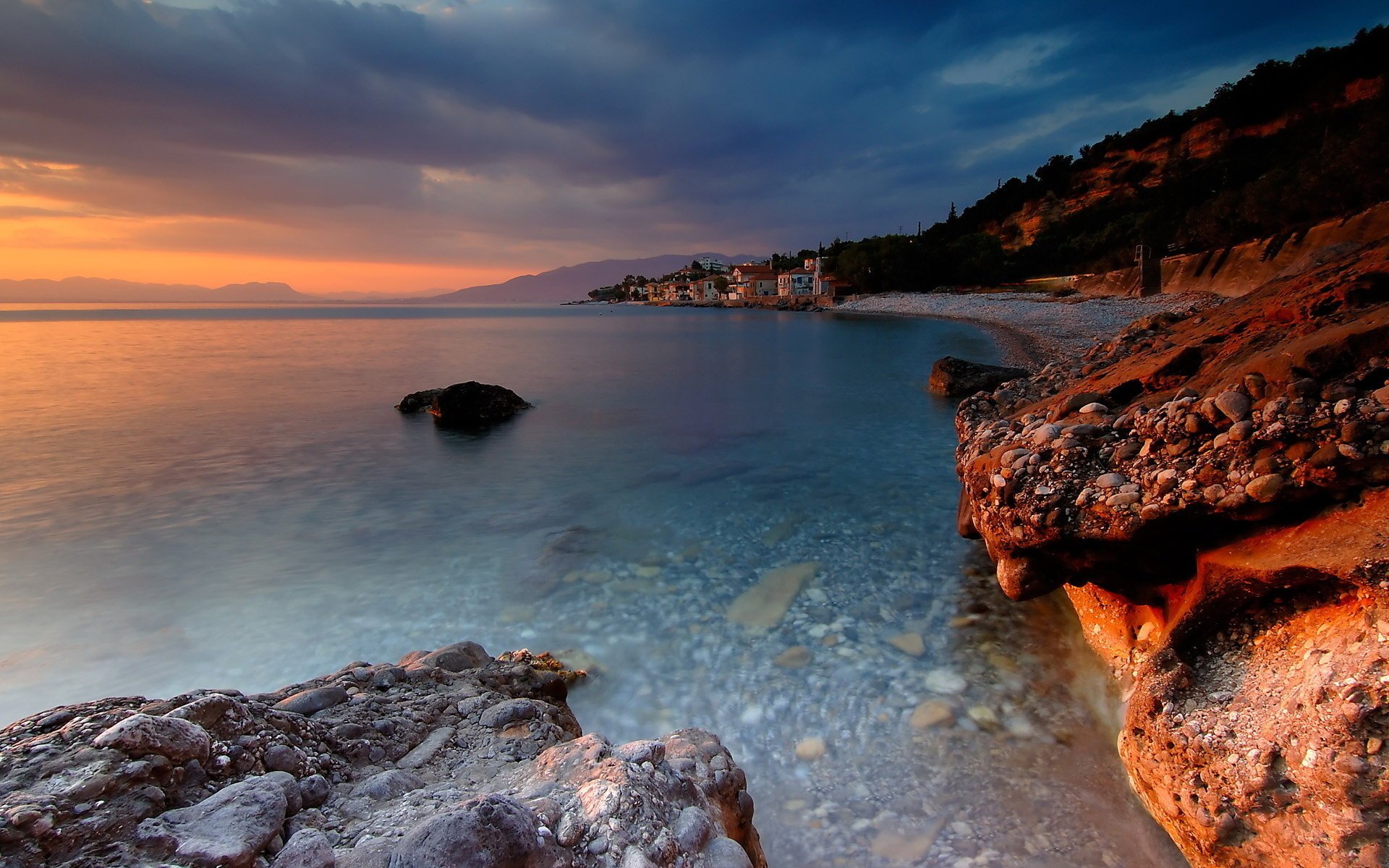 paesaggio sera pietre natura mare acqua tramonto nuvole orizzonte costa montagna costa casa resort