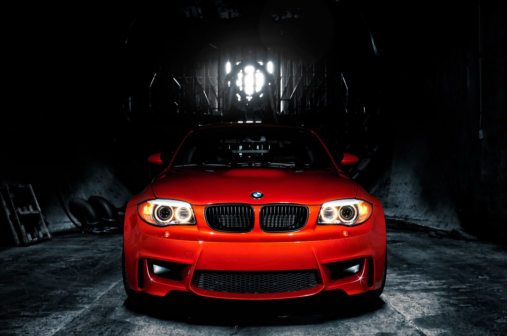 bmw 1m e82 bmw coupe sports car red background headlights optics techno industrial passenger cars cars auto car red car front twilight garage wheels tires bmw motor transport