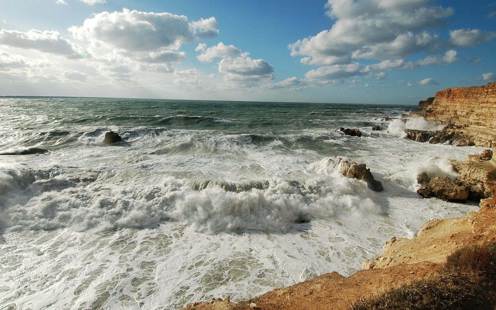 the black sea blue bay sea storm the sky clouds surf wave crimea stones rocks horizon shore nature