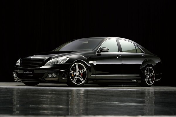 Black Mercedes on black background background