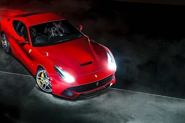 Red Ferrari on a neutral background