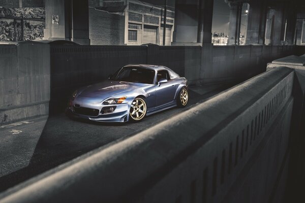 Honda s2000 car standing on the street in the dark