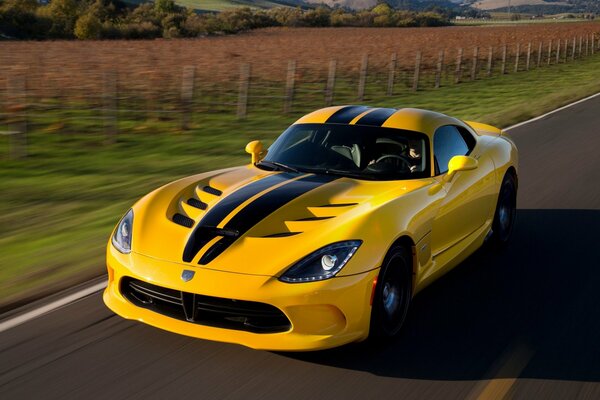 Yellow car with blue stripes