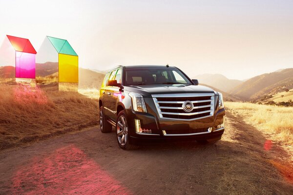 Cadillac escalade jeep in the rays of dawn