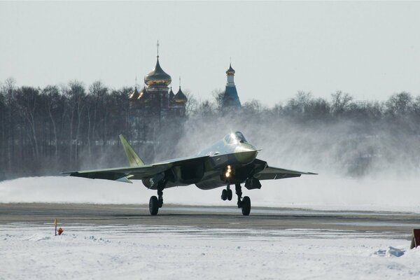 T-50 fighter jet on the background of the church