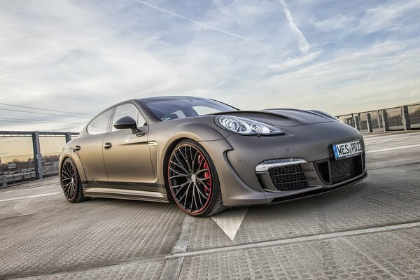 Porsche Panamera parking blue sky