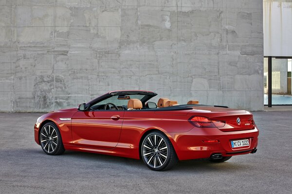 BMW red with a hinged roof