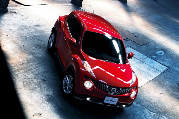 Red shiny Nissan top view