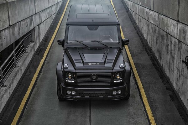 Black Mercedes G Class foreground