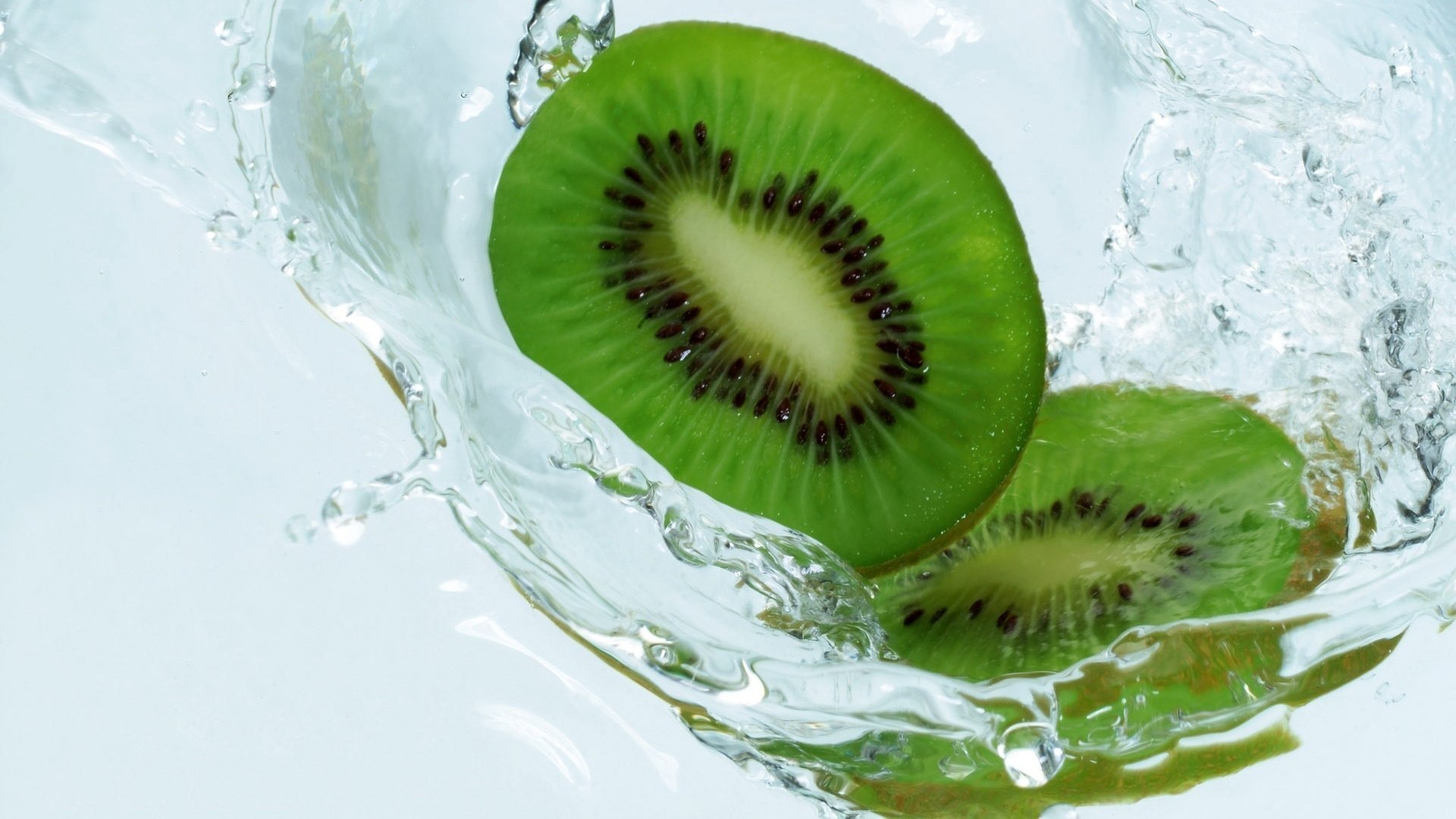 kiwi fruit water freshness movement background macro white green