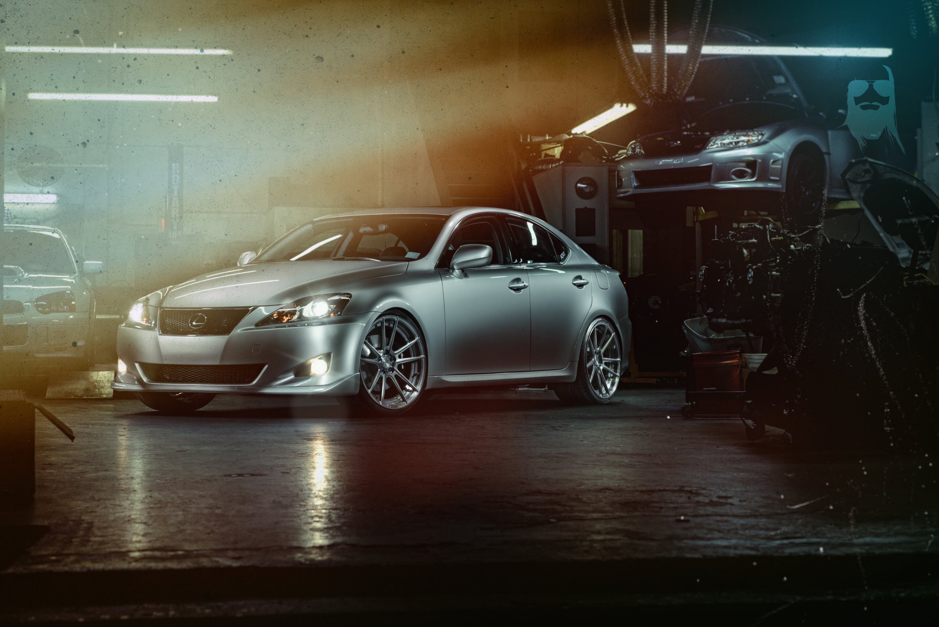 lexus is 250 plateado frente taller elevador