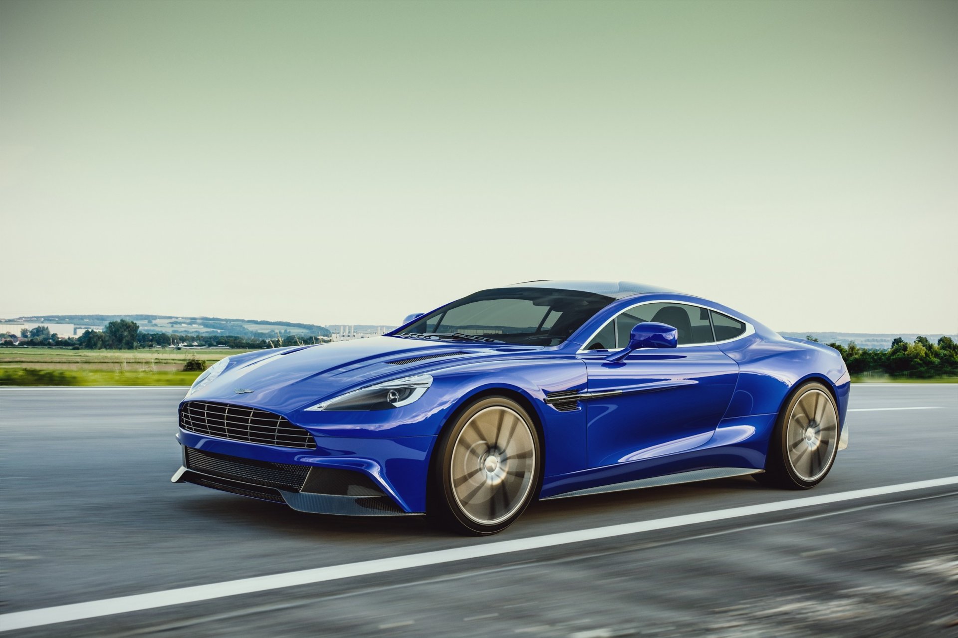 aston martin vanquish 2013 coche deportivo azul carretera velocidad por laffonte