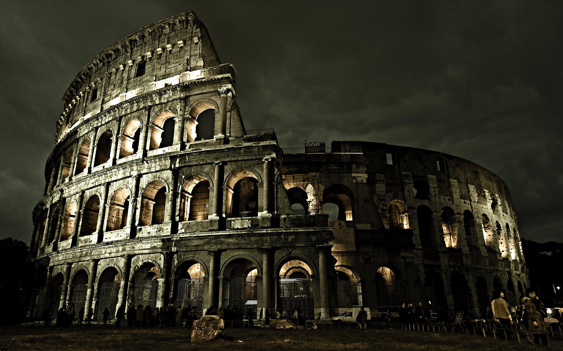 rome surakarta colosseum italy arena construction attraction antiquity old architecture structure night the sky windows twilight arch tourists museum