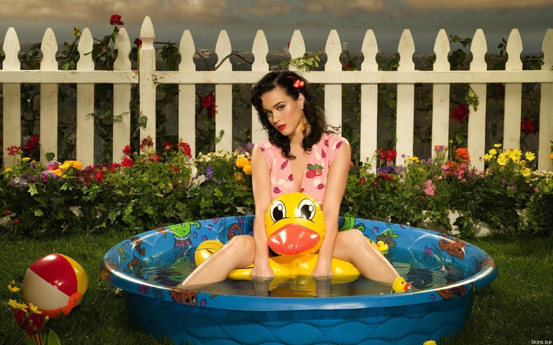 katy perry taz flowers singer star celebrity pool bathing water fence the fence grass greens the ball duck brunette beauty red lips look summer nature bow sundress water treatment lawn centerfolds women