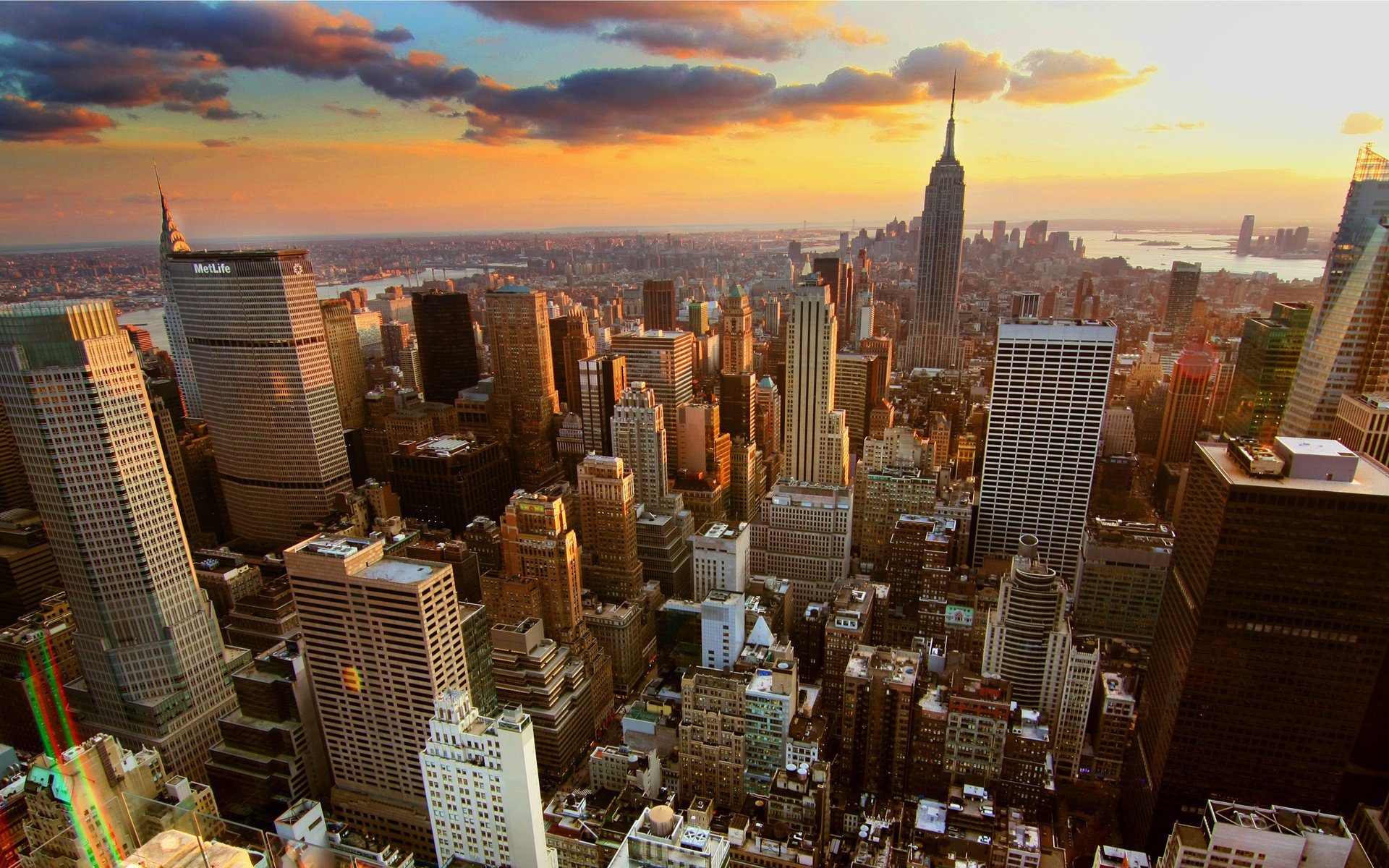 ciudad panorama puesta de sol edificios ciudad de nueva york nubes ciudades rascacielos metrópolis estados unidos américa vista altura torre noche cielo