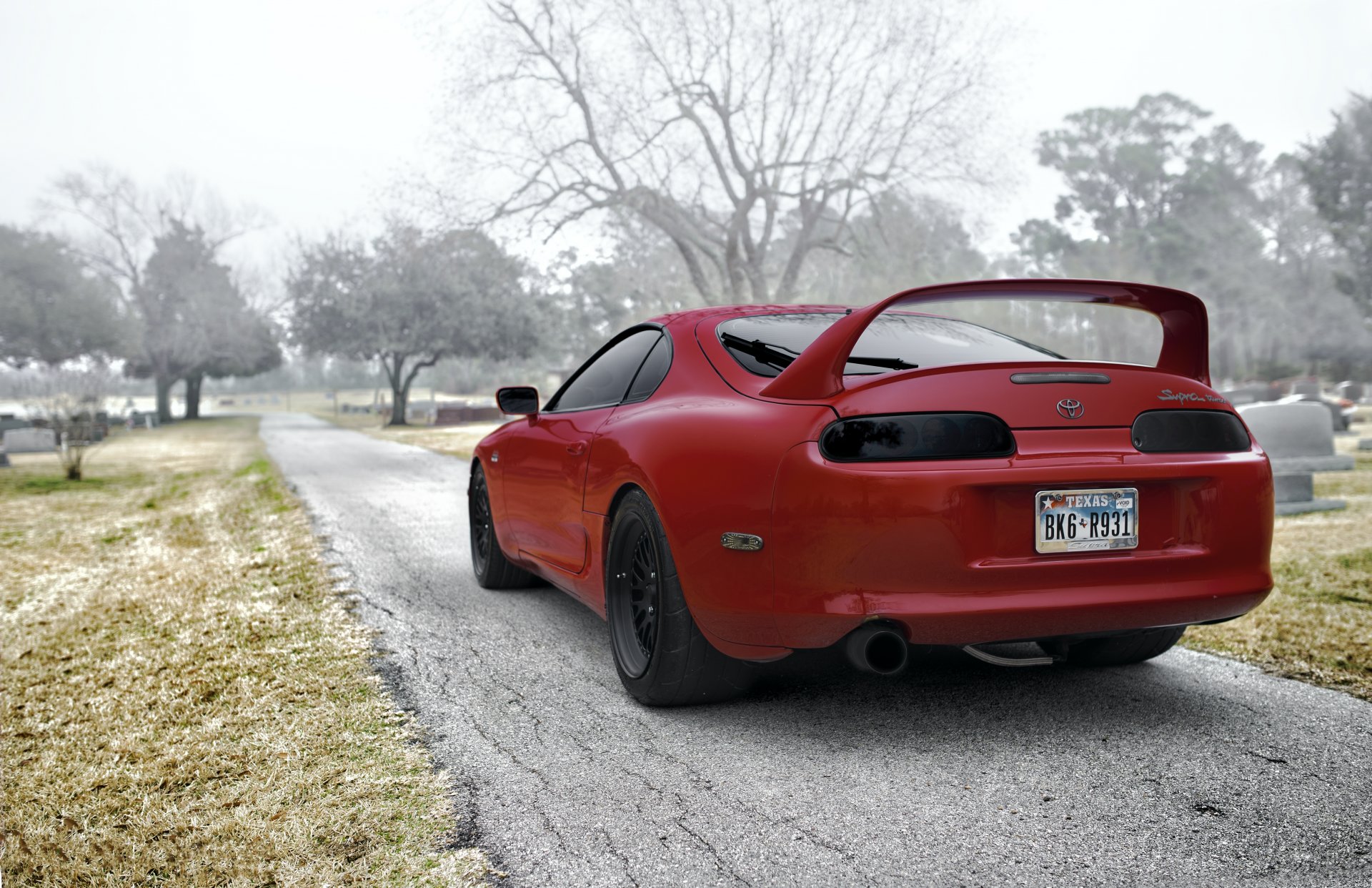 toyota above red toyota supra red rear tree