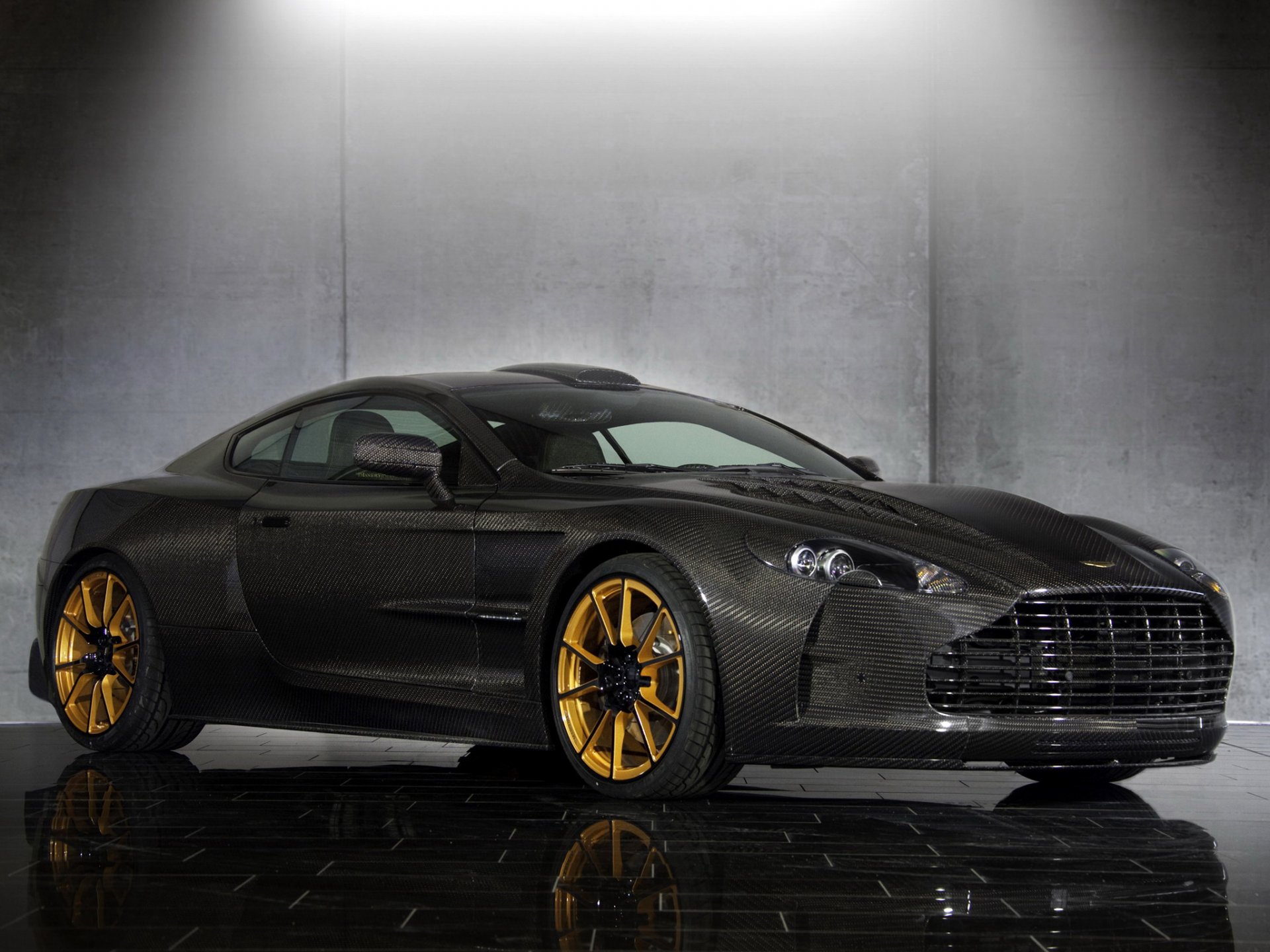 mansory cyrus aston martin db9 tło samochód carbon przód