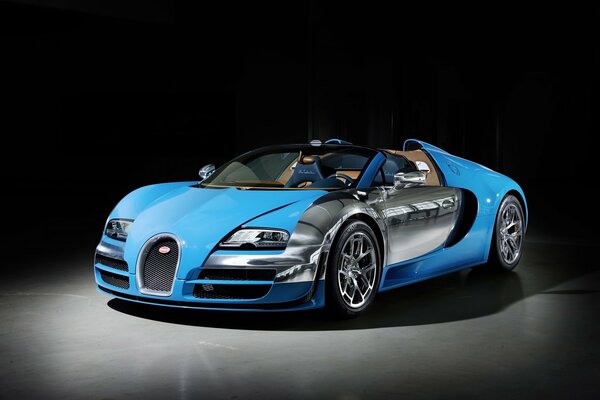 Auto bugatti veyron bleu sur fond sombre