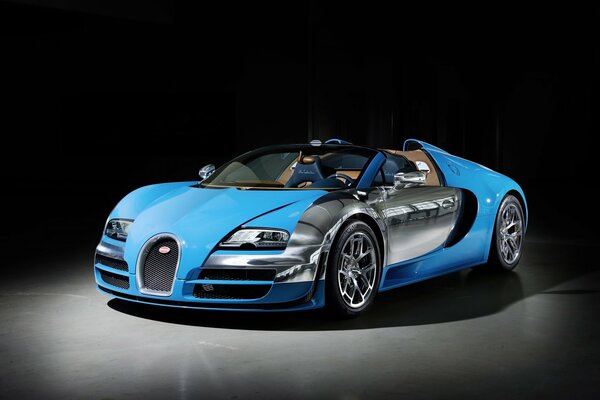 Auto bugatti Veyron w Kolorze Niebieskim na ciemnym tle