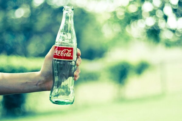 An empty bottle of Coca-Cola