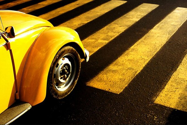 Yellow car on the road