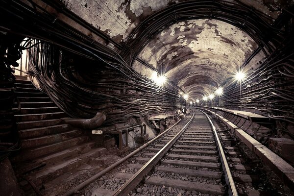 Stairs to the railway. The light at the end of the tunnel